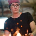 Lynda Metcalfe working at the forge